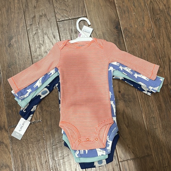 Size 9 months onesies, 4 pack- NWT - Picture 2 of 3